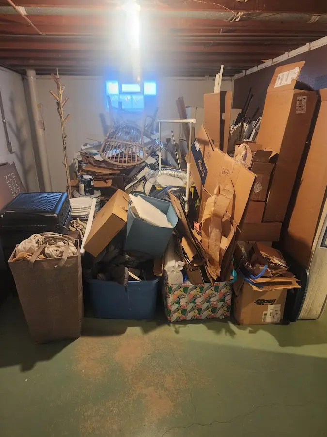 Roll-off dumpster container at job site for Construction Dumpster Rental in University